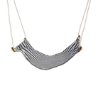 Striped fabric swing with wooden brackets on a white background
