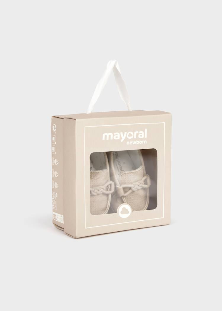 Mayoral baby shoes in a packaging box on a white background