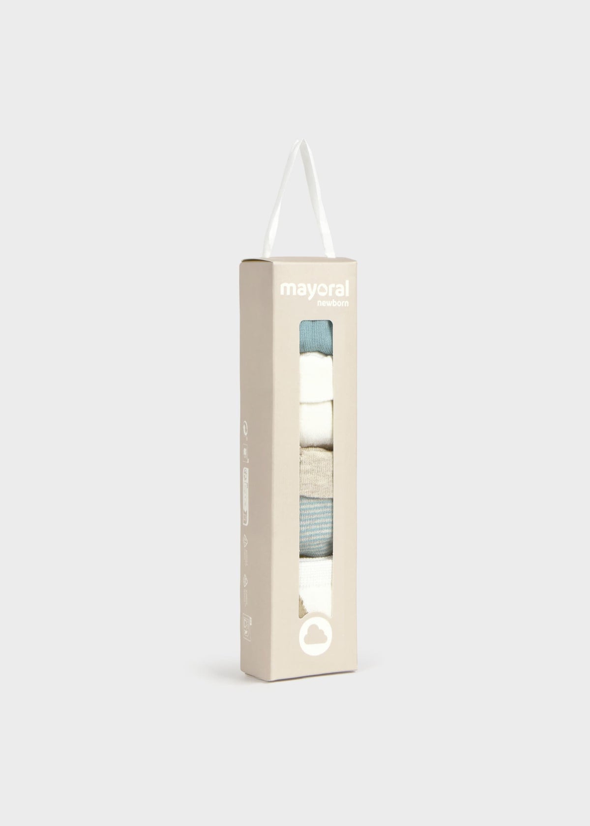 A tall, narrow beige cardboard package with a transparent window displaying folded socks in white, light blue, and gray. The brand name 'mayoral' is printed near the top, and a white hanging loop is attached at the top of the box.