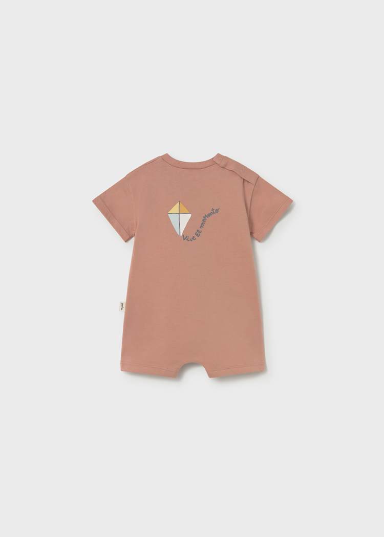 Brown dress with a graphic design on a white background