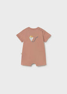 Brown dress with a graphic design on a white background