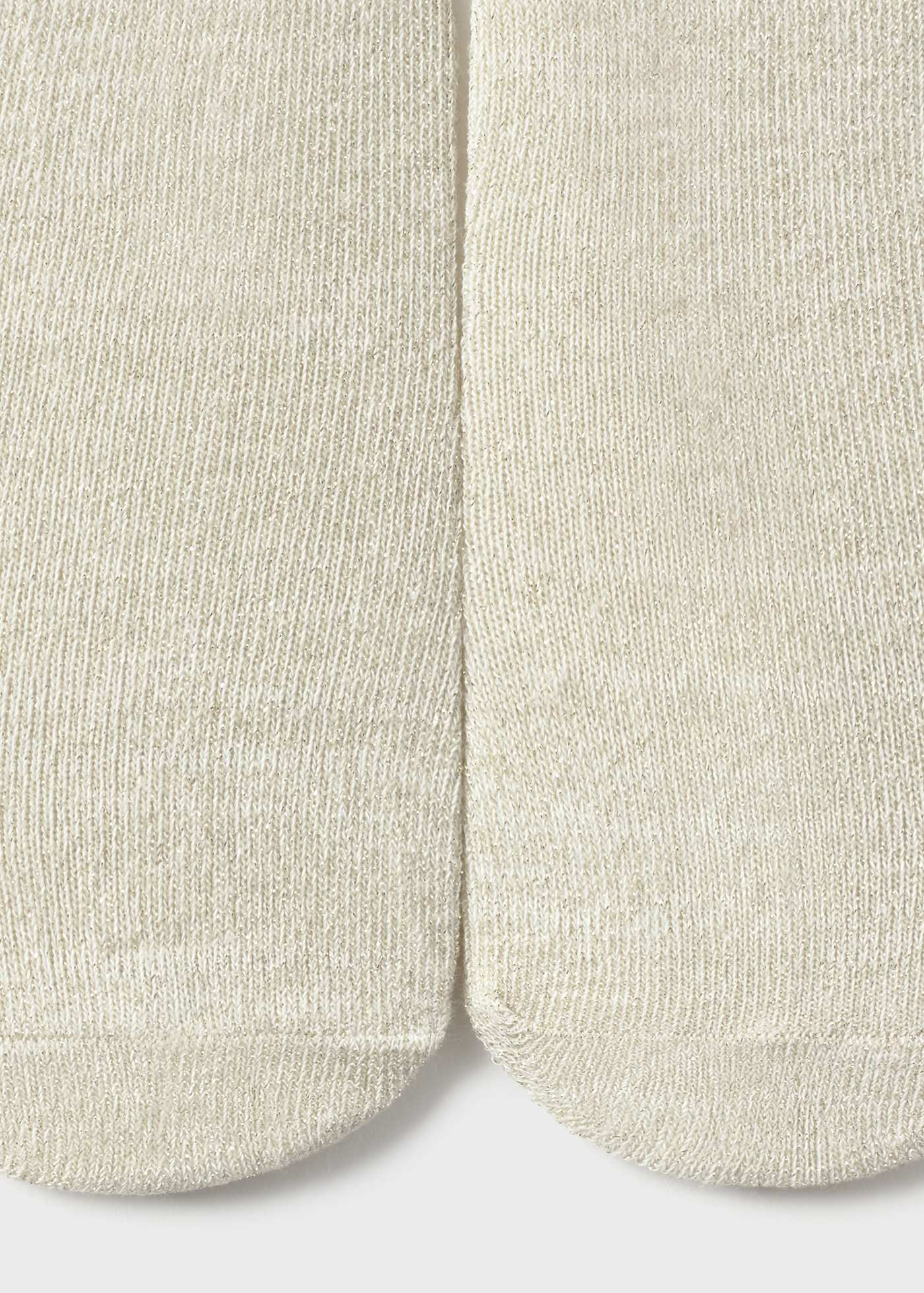 Close-up of beige socks on a light gray background
