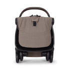 Brown baby stroller with black frame on a white background