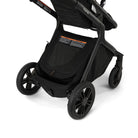 Black stroller with a visible brand logo on a white background