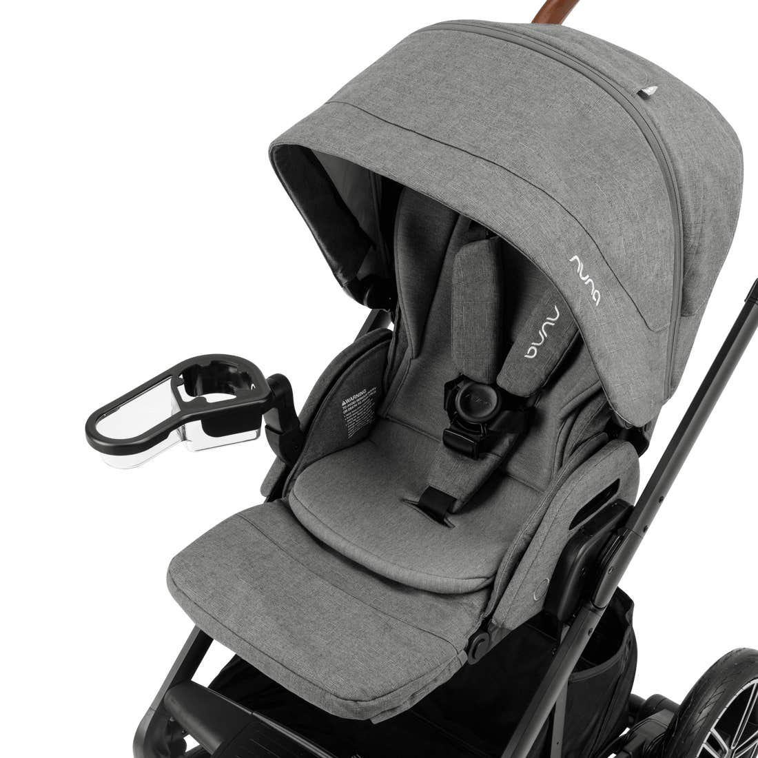Snack tray attached to a grey stroller showing it in an outward position