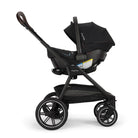 Black stroller with baby seat on a white background