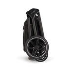 Black folding scooter with 'Nuna' branding on a white background