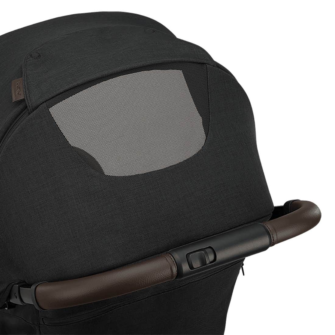 Nuna TRVL 360 lightweight travel stroller in Caviar black, shown in a folded, freestanding position against a clean white background with a brown leatherette pushbar visible at the top.