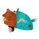 Plush toy with a brown bear face and teal shell featuring cartoon characters on a white background
