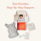 Baby carrier with accessories and support box on a light background