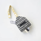 Black-and-white striped Wee Gallery plush house stroller toy with a yellow-and-white patterned hanging strap.