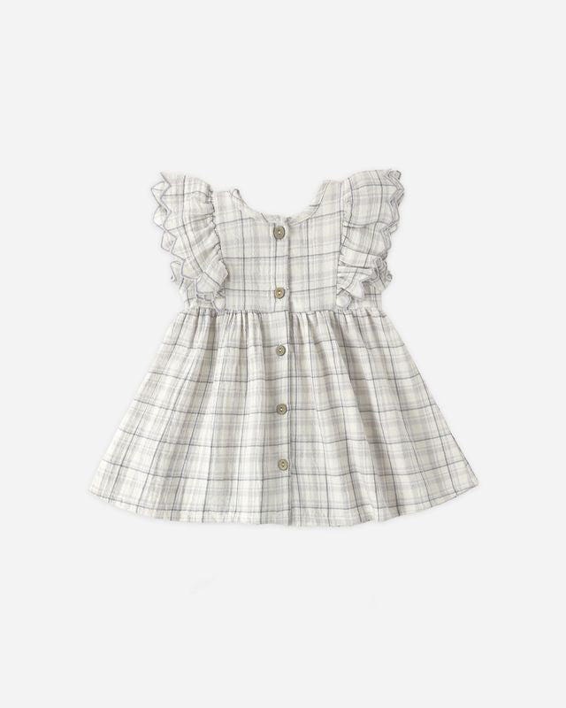 Plaid dress with ruffled sleeves on a white background