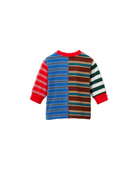 A children's long-sleeve striped top with a split design: one side has blue, red, and white stripes, and the other side has brown, beige, and red stripes. The sleeves also feature distinct stripe patterns in red, green, and white, with a red crew neck.
