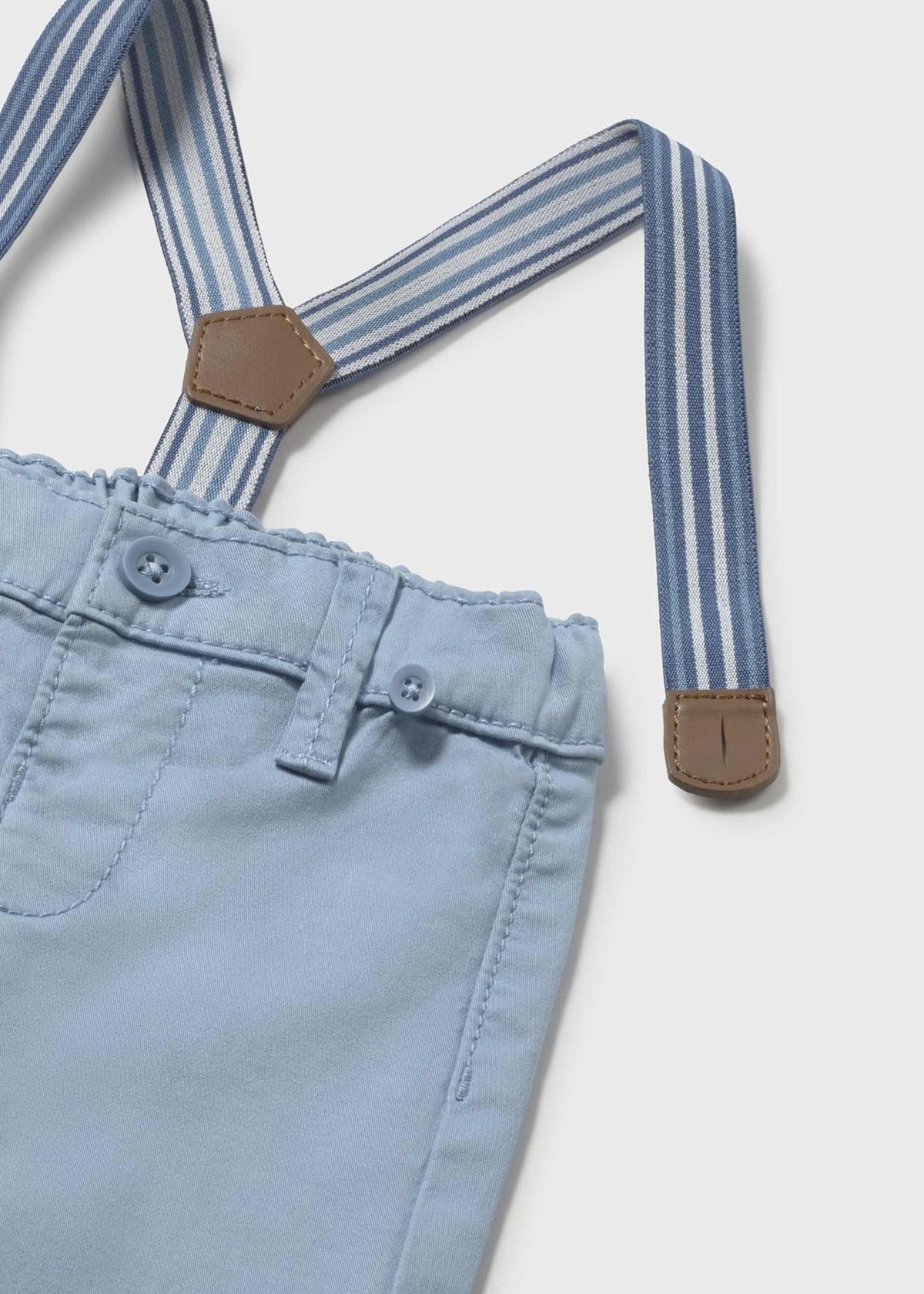 Light blue pants with striped suspenders on a white background