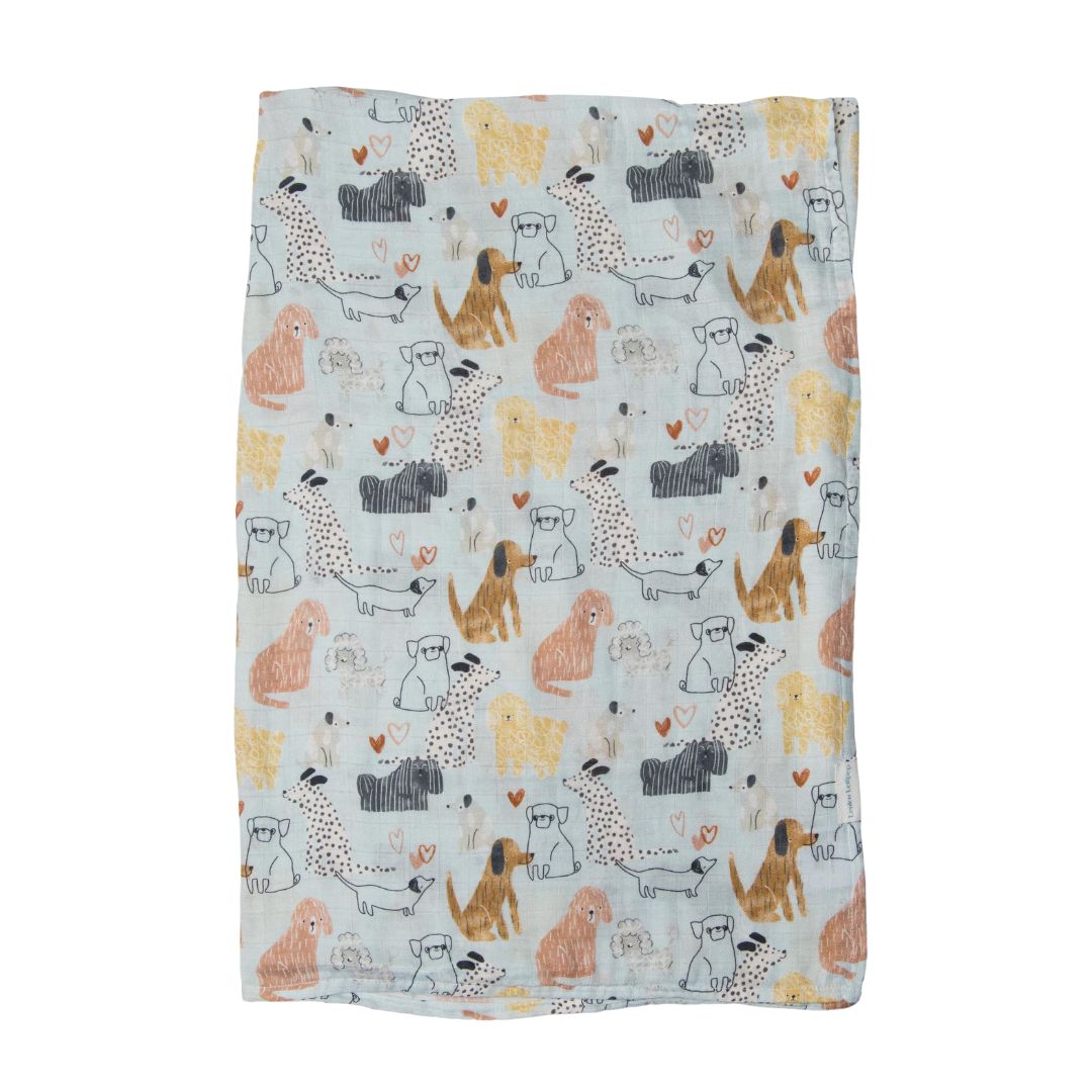 Blue cotton blanket with dog pattern on a white background