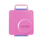 A pink plastic lunch box with a handle and a circular lid insert, featuring the brand name 'OMIE' embossed on the front, set against a plain white background.