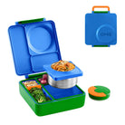 Blue and green bento box with food compartments and a small container, featuring the brand 'OMIE'.
