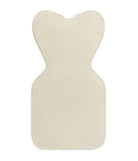 Beige bath mat with a unique cut-out design on a white background