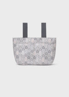 Patterned tote bag with black straps on a white background
