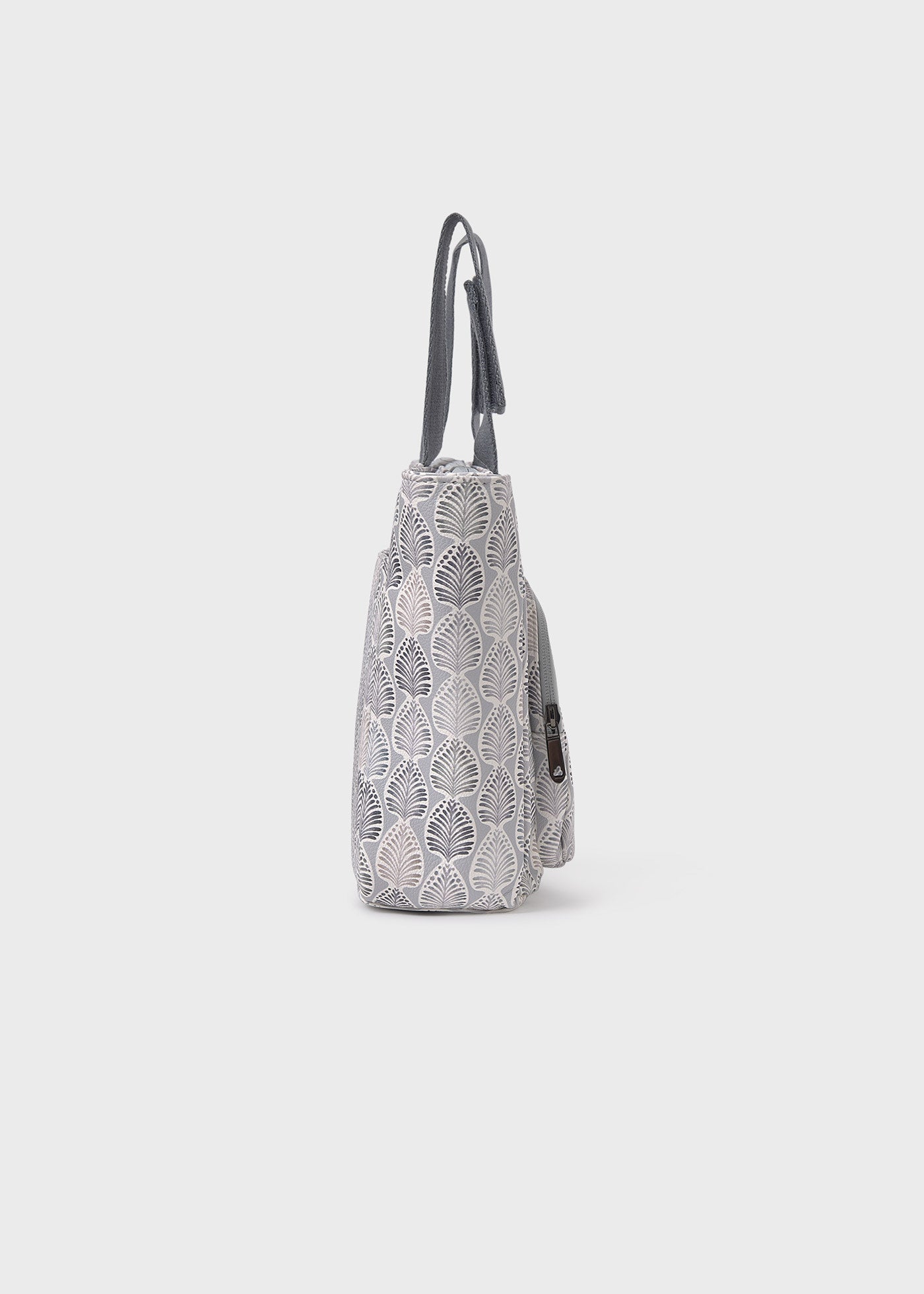 Gray lace-patterned handbag on a light gray background