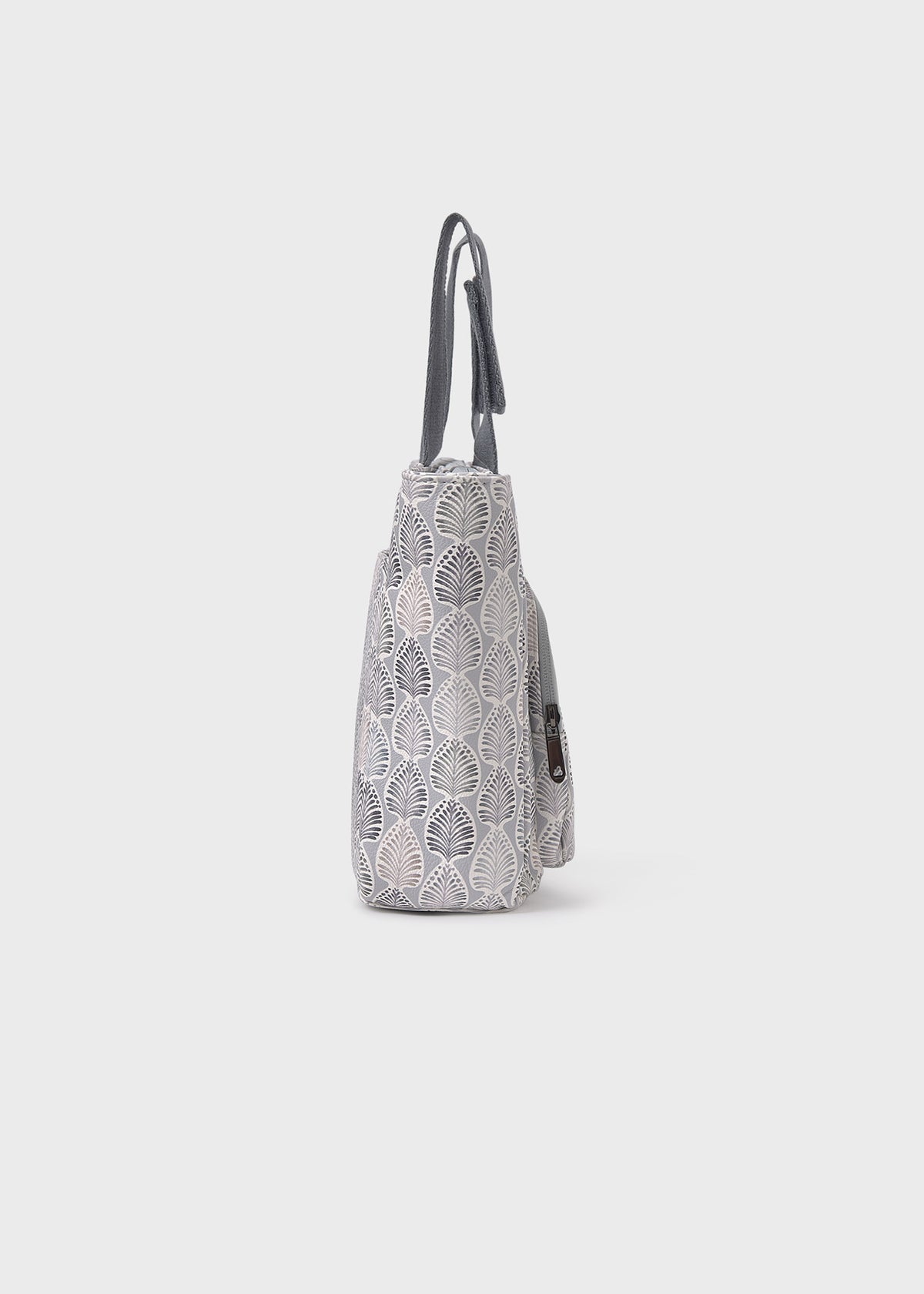 Gray lace-patterned handbag on a light gray background