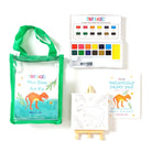 Tiny Easel Mini Dino Art Kit with watercolor set, paper pad, and mini easel on a white background