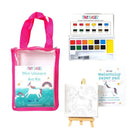 Mini unicorn art kit with pink tote bag, watercolor palette, and paper pad on a white background