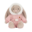 Plush toy rabbit in a pink snowsuit with a white hood on a white background