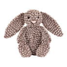 Plush bunny toy with a soft texture on a white background