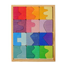 Colorful wooden puzzle with geometric shapes in a wooden frame on a white background