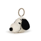 Dog-shaped keychain with black ears and nose on a white background
