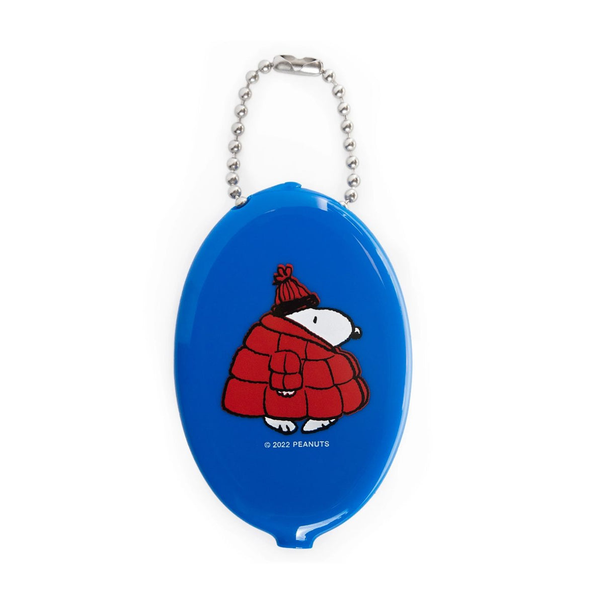 Blue oval keychain with cartoon character in red coat and hat on a white background