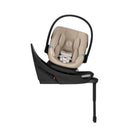 Baby car seat with black base on a white background