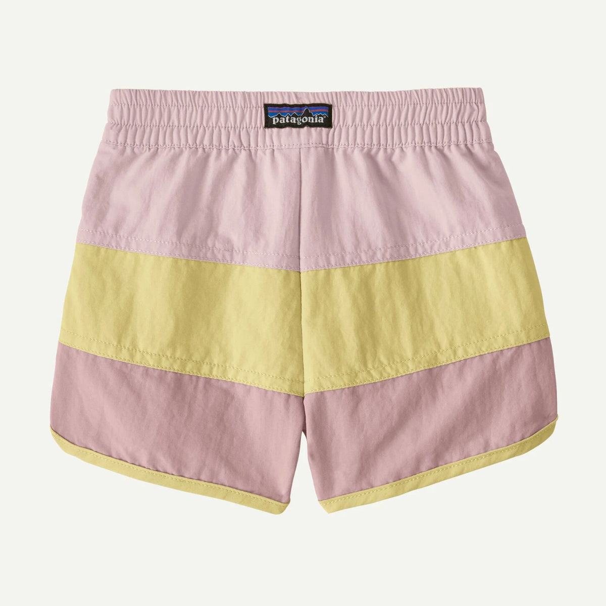 Pink and yellow striped shorts with Patagonia logo on a white background