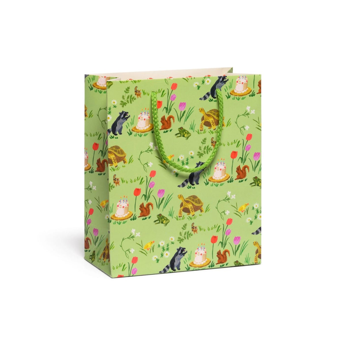 Gift bag with animal and nature pattern on a white background