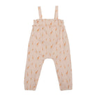 Baby romper with giraffe pattern on a white background