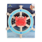 A baby toy ship's wheel with a crab in the center, mounted on a branded retail backing card. The product has a light blue outer ring, beige wheel spokes, and a coral-red crab with blue accents.