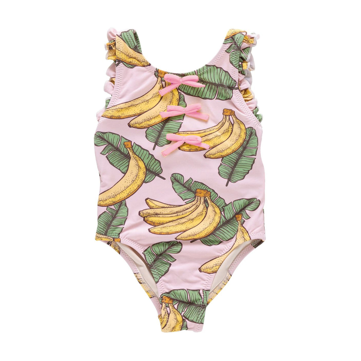 A pink one-piece baby swimsuit with a banana and banana leaf print, featuring ruffled shoulder straps and three pink tie-front bows, shown flat on a white background.