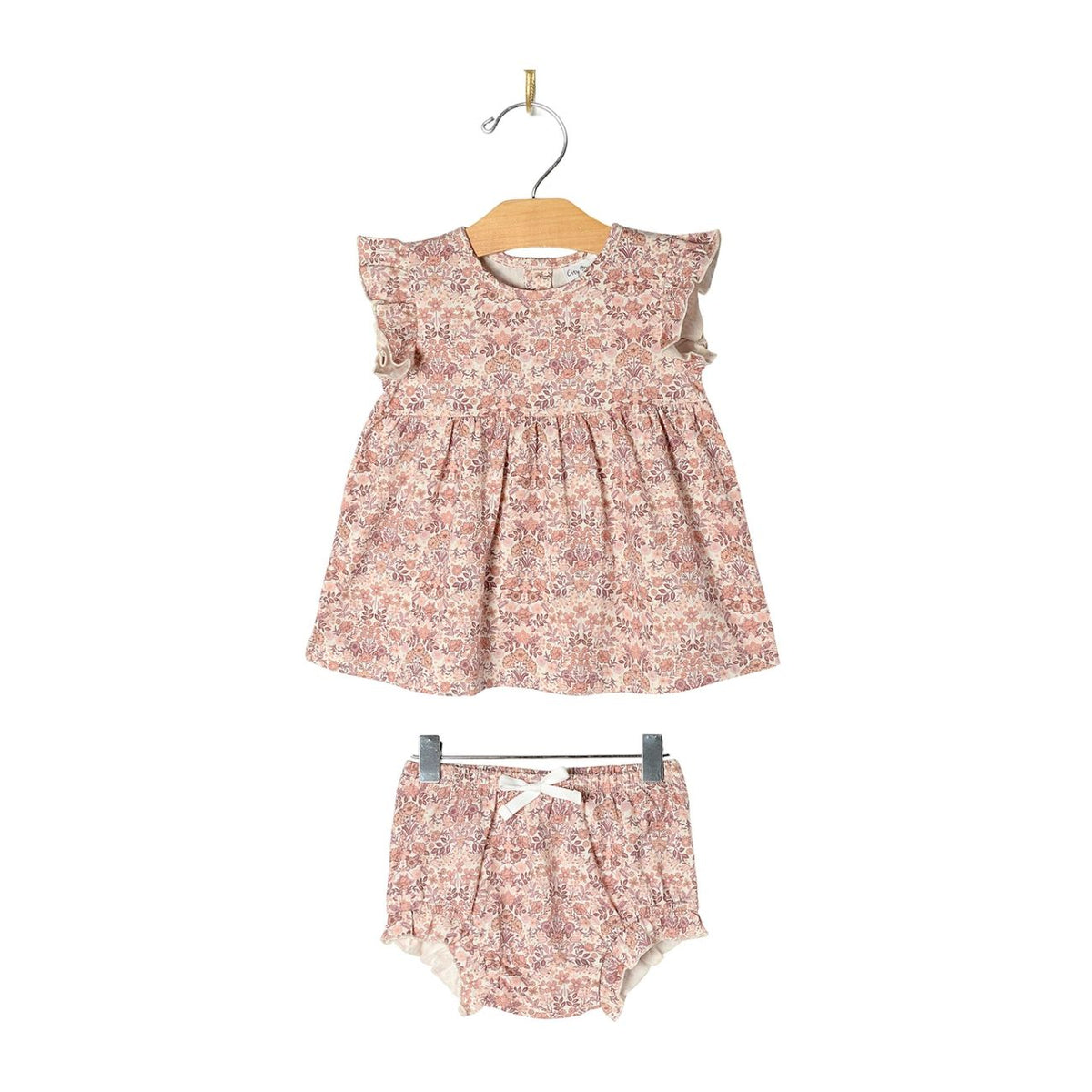 Baby dress and bloomers set with floral pattern on a white background