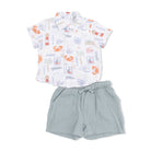 Children's outfit with a patterned shirt and shorts on a white background