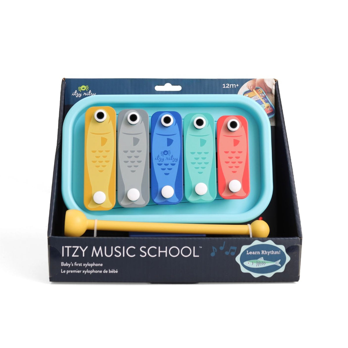 Itzy Music School toy set packaging with colorful xylophone-like instruments.