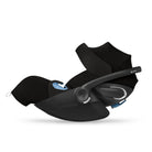 Black baby car seat with blue accents on a white background