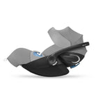 Baby car seat with canopy on a white background