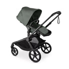 Black and gray stroller on a white background