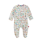 A baby footed sleeper with long sleeves and an all-over tennis racket print on a cream-colored fabric, shown against a plain white background.