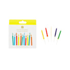 Packaged multicolored birthday candles with a white background