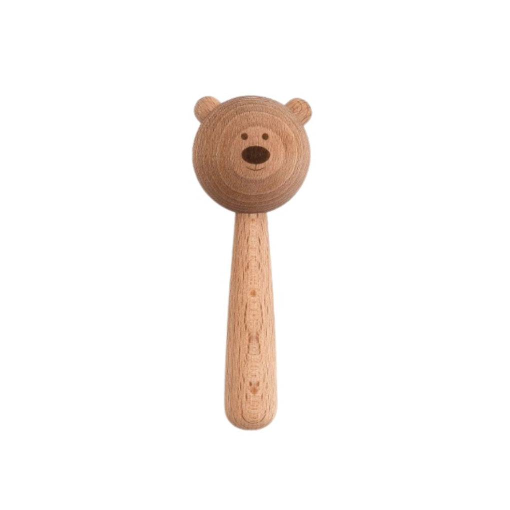 Wooden teddy bear rattle on a white background