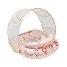Baby playpen with canopy and pink fabric inside on a white background