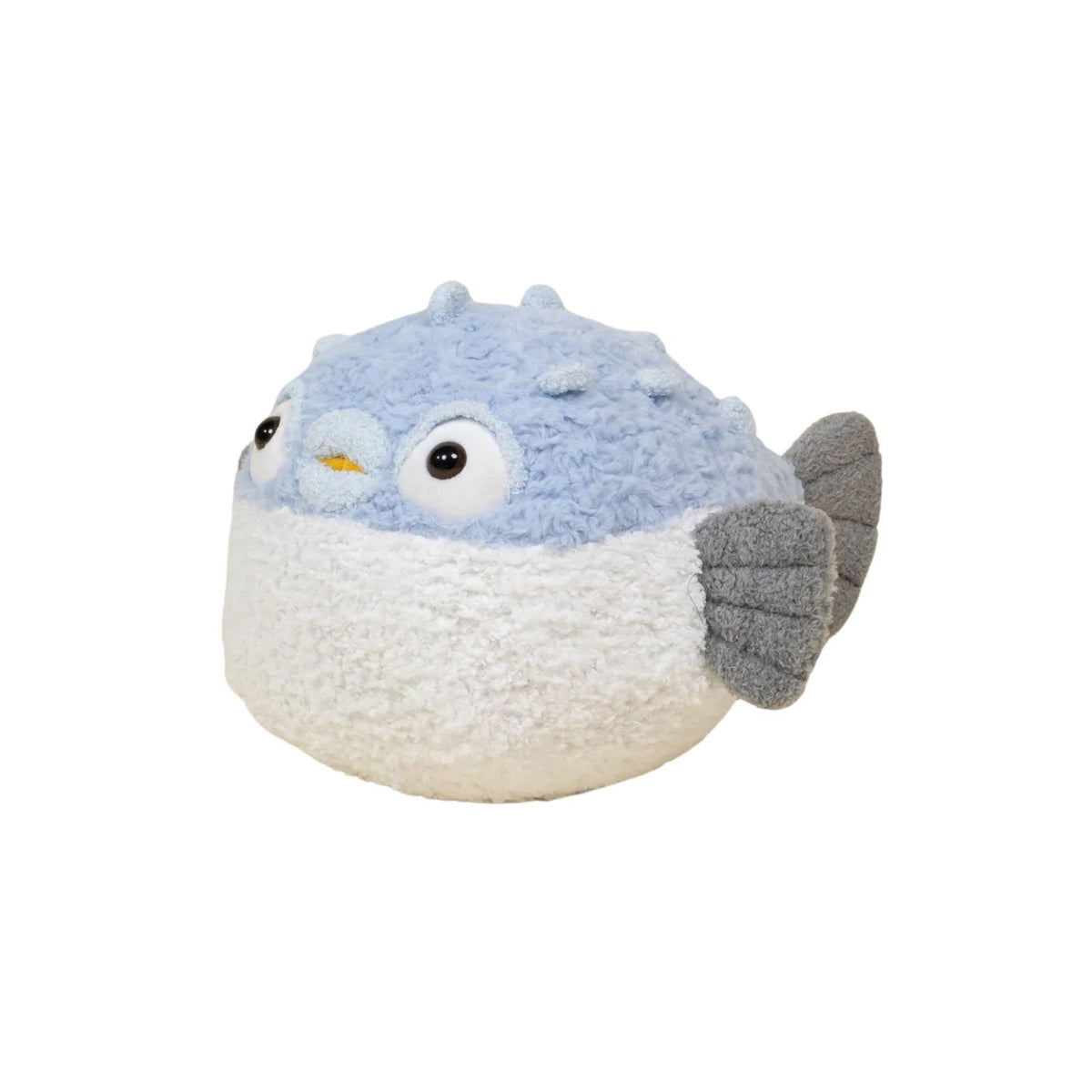 Plush toy resembling a puffer fish with blue and white body on a white background