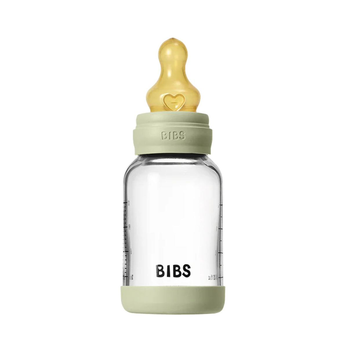 Clear baby bottle with green cap and gold nipple on a white background
